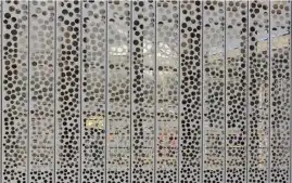 Customized Punched Plates vs. Traditional Perforated Materials: A Comparison